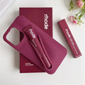 Pink Rhode lip case with pen and 'rhode' branding on a white background